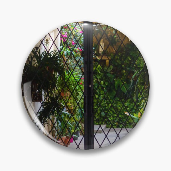 Item preview, Wrought Iron Gate Framing Sunlit Courtyard Garden With Potted Plants And Lush Foliage designed and sold by Nmallia.