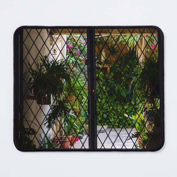 Item preview, Wrought Iron Gate Framing Sunlit Courtyard Garden With Potted Plants And Lush Foliage designed and sold by Nmallia.