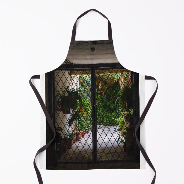 Item preview, Wrought Iron Gate Framing Sunlit Courtyard Garden With Potted Plants And Lush Foliage designed and sold by Nmallia.