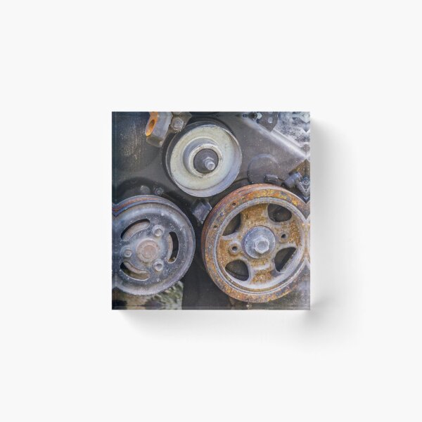 Item preview, Close-Up Of Rusty Engine Pulleys And Worn Belts On Old Automotive Mechanical Part designed and sold by Nmallia.