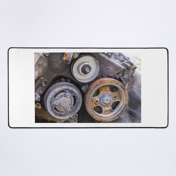 Item preview, Close-Up Of Rusty Engine Pulleys And Worn Belts On Old Automotive Mechanical Part designed and sold by Nmallia.