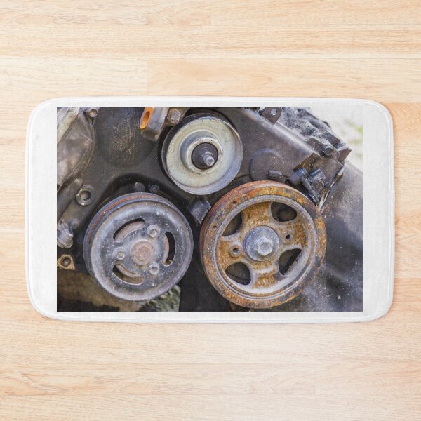Item preview, Close-Up Of Rusty Engine Pulleys And Worn Belts On Old Automotive Mechanical Part designed and sold by Nmallia.