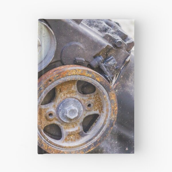Item preview, Close-Up Of Rusty Engine Pulleys And Worn Belts On Old Automotive Mechanical Part designed and sold by Nmallia.