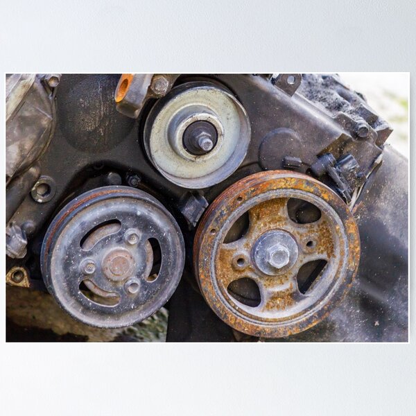 Item preview, Close-Up Of Rusty Engine Pulleys And Worn Belts On Old Automotive Mechanical Part designed and sold by Nmallia.