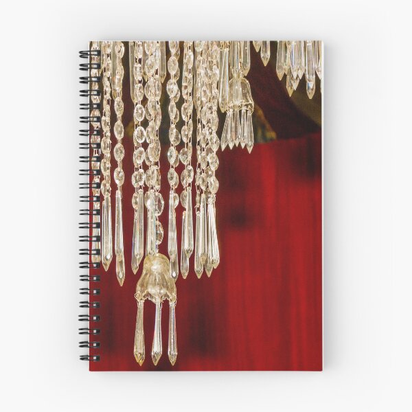 Item preview, Crystal Chandelier Detail With Hanging Prisms Against Rich Red Theater Curtain designed and sold by Nmallia.