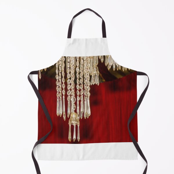 Item preview, Crystal Chandelier Detail With Hanging Prisms Against Rich Red Theater Curtain designed and sold by Nmallia.