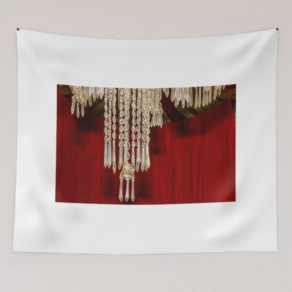 Item preview, Crystal Chandelier Detail With Hanging Prisms Against Rich Red Theater Curtain designed and sold by Nmallia.