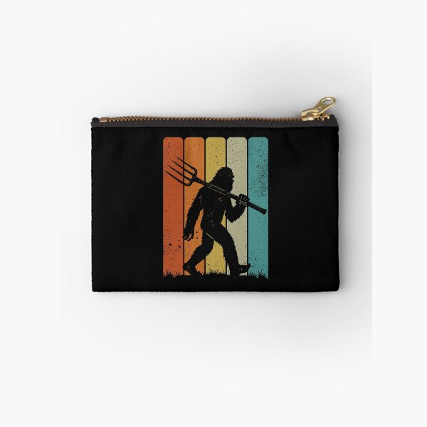 Item preview, Bigfoot Farmer - Retro Sasquatch Carrying a Pitchfork designed and sold by gunaone-design.