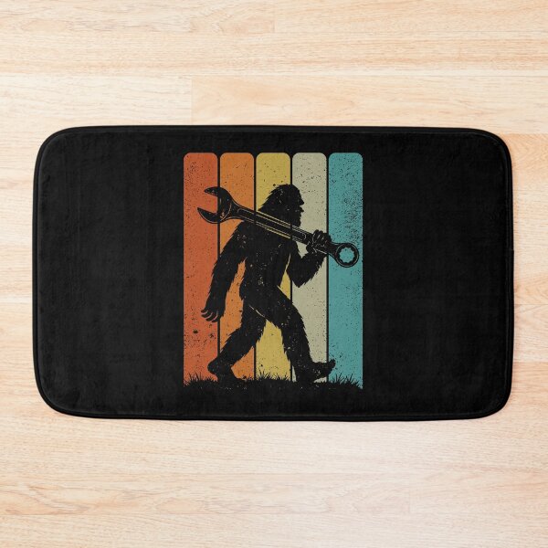 Item preview, Bigfoot Mechanic - Retro Sasquatch carrying a Giant Combination Wrench designed and sold by gunaone-design.