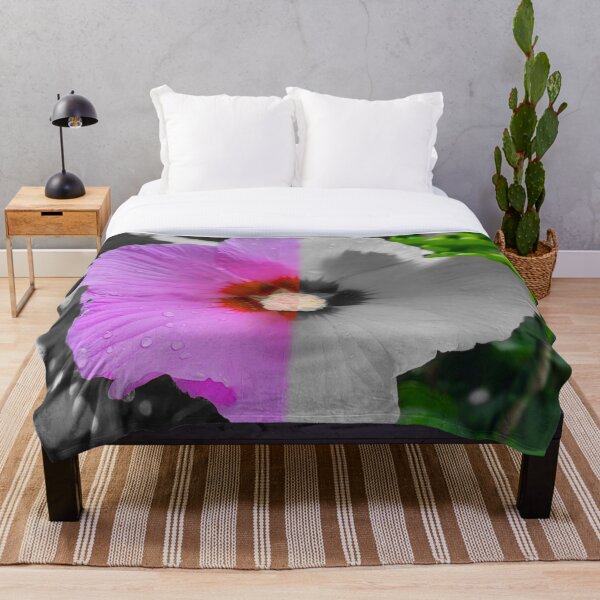 Item preview, Mid-colored hibiscus flower with water drops – artistic contrast. designed and sold by Catfcreations.