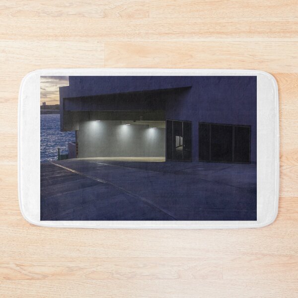 Item preview, Empty Waterfront Parking Garage Ramp at Dusk With Concrete Architecture and Moody Lighting designed and sold by Nmallia.
