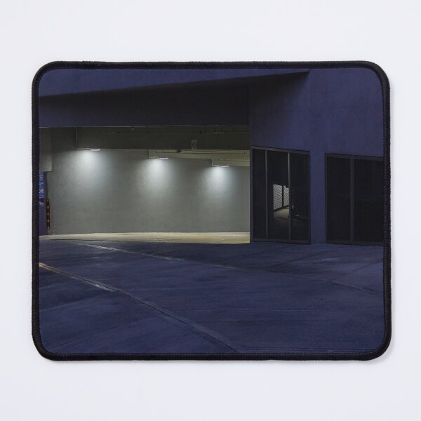 Item preview, Empty Waterfront Parking Garage Ramp at Dusk With Concrete Architecture and Moody Lighting designed and sold by Nmallia.
