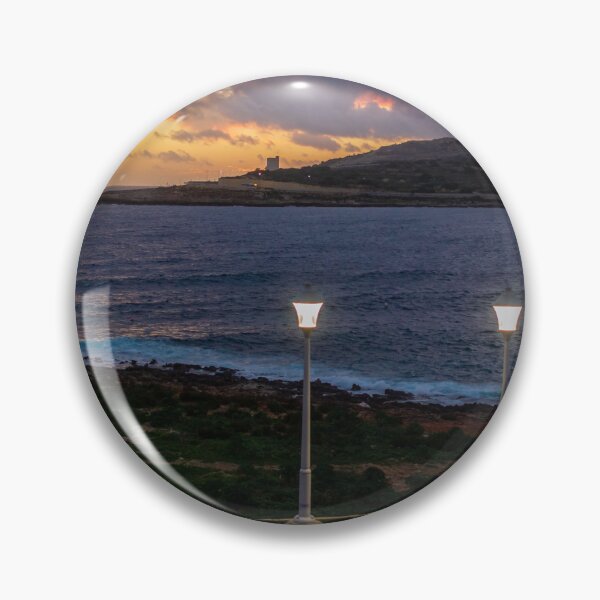 Item preview, Coastal Sunset Over Rocky Shoreline With Lit Lampposts and Distant Headland at Dusk designed and sold by Nmallia.