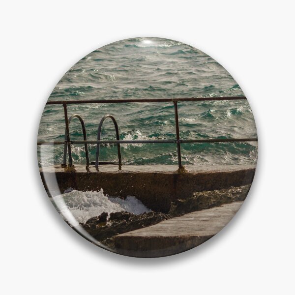 Item preview, Rusty Handrail And Concrete Pier With Ladder Beside Choppy Sea Waves At Coastline designed and sold by Nmallia.