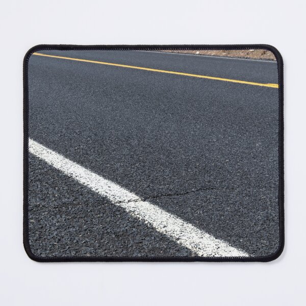 Item preview, Close diagonal shot of blacktop and lane lines designed and sold by lisavonbiela.