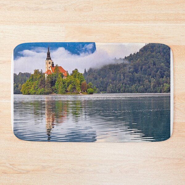 Item preview, Morning view of Pilgrimage Church of the Assumption of Maria, Bled lake landscape, Julian Alps, Slovenia designed and sold by goceris.