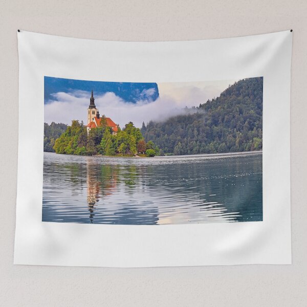 Item preview, Morning view of Pilgrimage Church of the Assumption of Maria, Bled lake landscape, Julian Alps, Slovenia designed and sold by goceris.