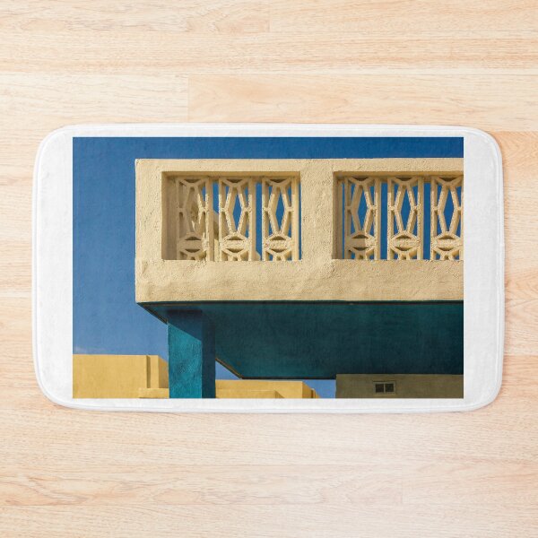 Item preview, Architectural Concrete Balcony With Geometric Screen and Blue Pillar Against Clear Sky designed and sold by Nmallia.