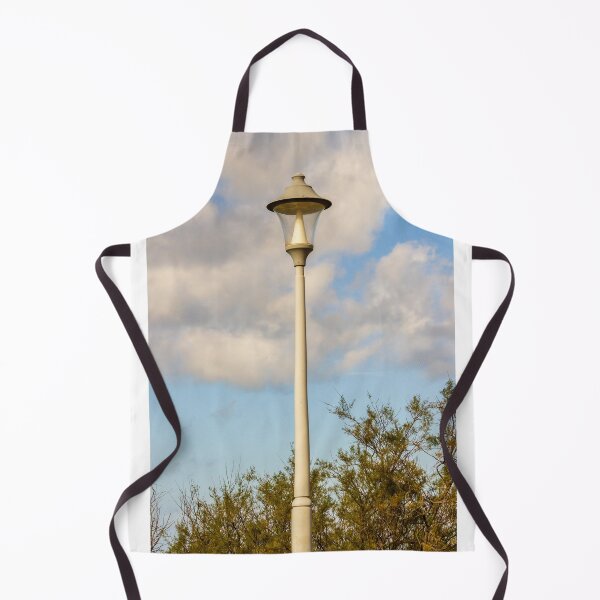 Item preview, Vintage Street Lamp Post Against Blue Sky With Clouds and Tree Branches in Daylight designed and sold by Nmallia.