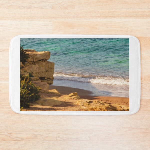 Item preview, Rocky Cliff and Turquoise Sea With Gentle Waves on a Sunny Sandy Beach Coastal Landscape designed and sold by Nmallia.