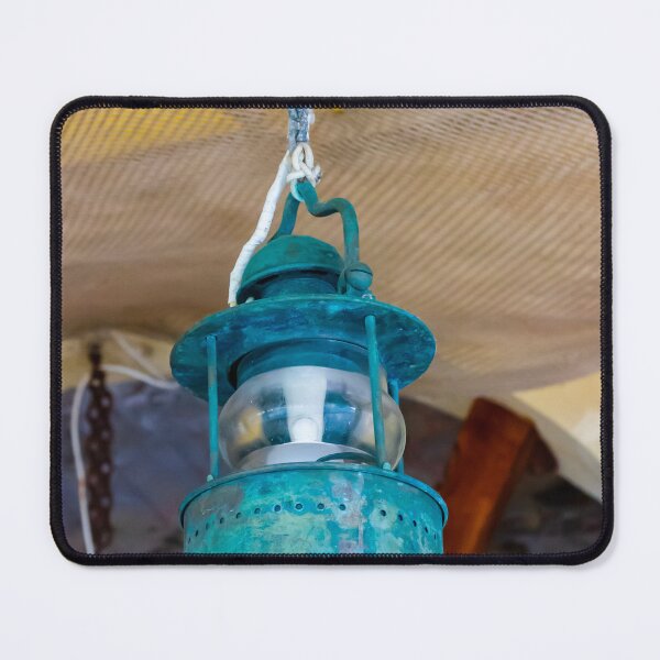Item preview, Vintage Hanging Lantern With Patina Finish Suspended From Chain Against Textured Ceiling designed and sold by Nmallia.