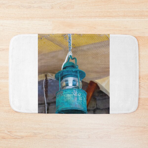 Item preview, Vintage Hanging Lantern With Patina Finish Suspended From Chain Against Textured Ceiling designed and sold by Nmallia.