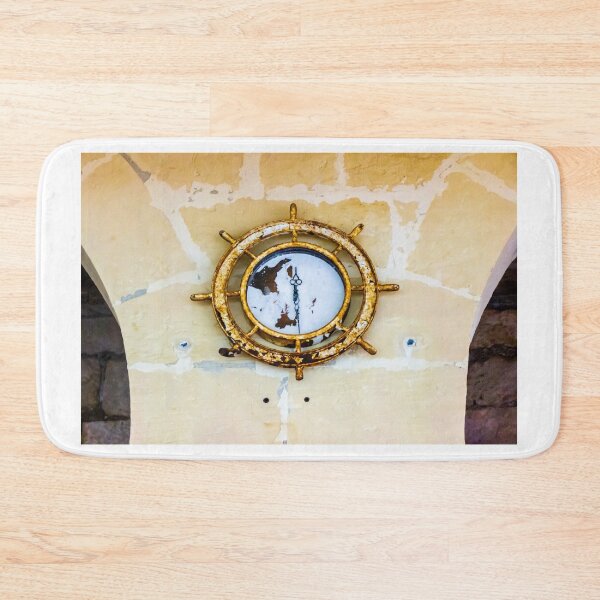 Item preview, Rusty Ship Wheel Clock Mounted On Stone Wall — Vintage Nautical Decor With Peeling Paint designed and sold by Nmallia.