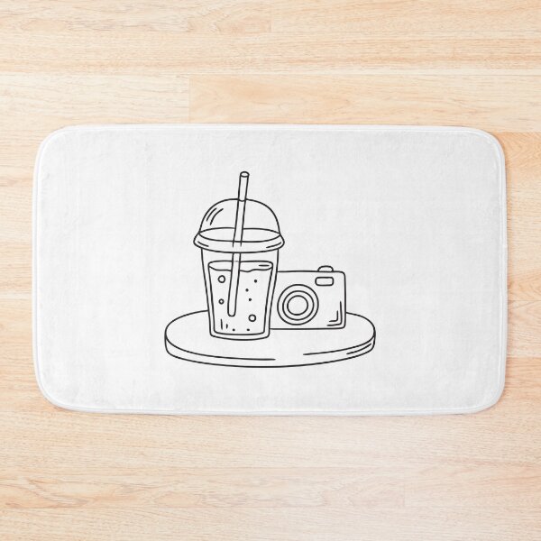 Item preview, A camera placed on a table next to a chilled drink designed and sold by rasagamastore.