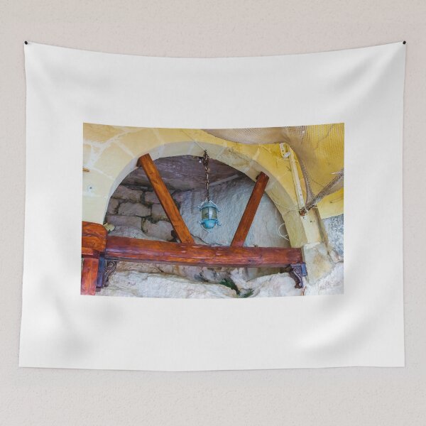 Item preview, Hanging Lantern Under Wooden Beams and Stone Archway in Rustic Historic Mediterranean Interior designed and sold by Nmallia.