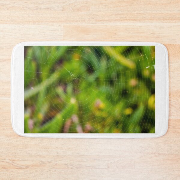 Item preview, Delicate Spider Web Close-Up Over Blurred Green Foliage With Dew And Radial Pattern designed and sold by Nmallia.