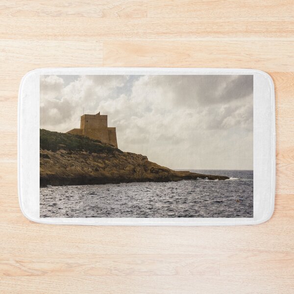 Item preview, Solitary Coastal Watchtower on Rocky Headland Overlooking Sea and Dramatic Cloudy Sky designed and sold by Nmallia.