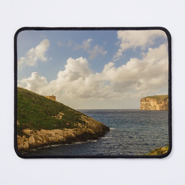 Item preview, Dramatic Coastal Cliffs and Green Headland Overlooking a Calm Blue Bay Under Cloudy Sky designed and sold by Nmallia.