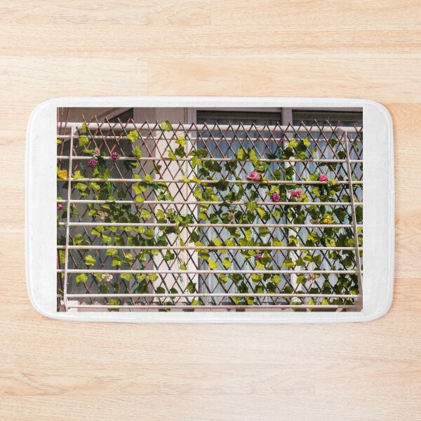 Item preview, Green Ivy Climbing Trellis on Balcony Window With Decorative Flowers and Metal Railing designed and sold by Nmallia.