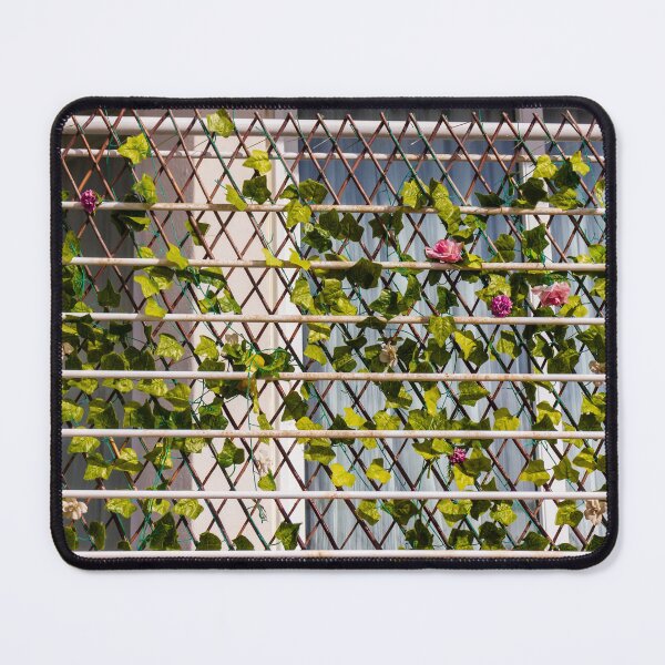 Item preview, Green Ivy Climbing Trellis on Balcony Window With Decorative Flowers and Metal Railing designed and sold by Nmallia.
