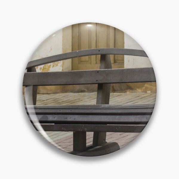 Item preview, Empty Wooden Bench on Quiet Street Pavement Near Old Doorway in Rustic Urban Courtyard designed and sold by Nmallia.