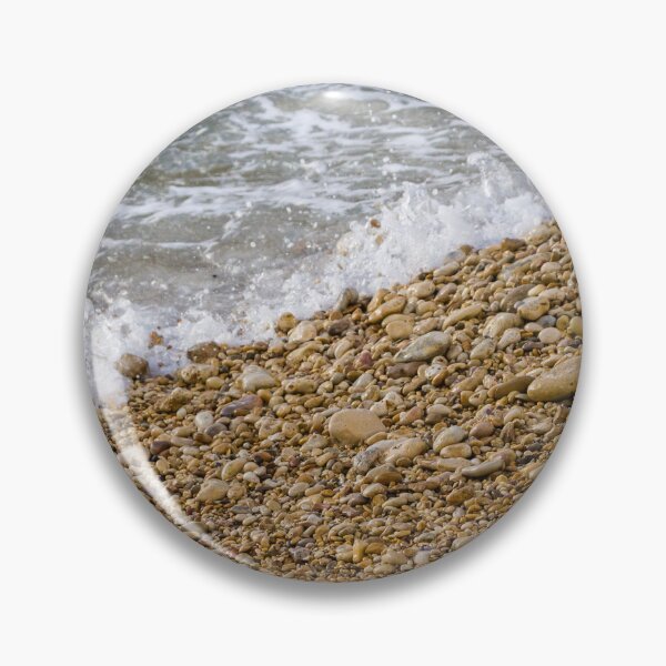 Item preview, Pebble Beach Shoreline With Gentle Waves Splashing Over Smooth Stones On Coastal Seashore designed and sold by Nmallia.