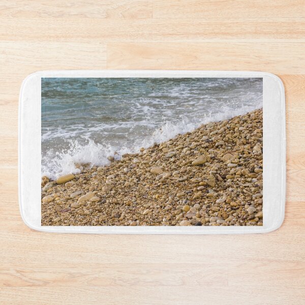 Item preview, Pebble Beach Shoreline With Gentle Waves Splashing Over Smooth Stones On Coastal Seashore designed and sold by Nmallia.