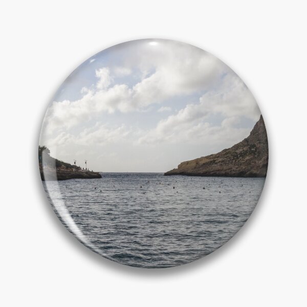 Item preview, Overcast Coastal Bay With Rocky Cliffs and Waterfront Apartments Overlooking Calm Sea designed and sold by Nmallia.