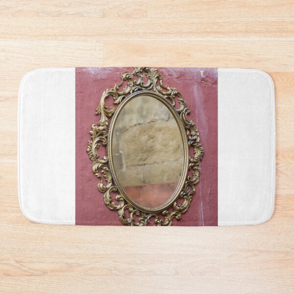Item preview, Ornate Gold Mirror With Antique Baroque Frame Hanging On Textured Red Plastered Wall designed and sold by Nmallia.