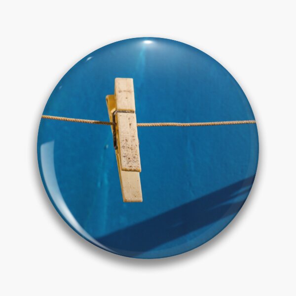 Item preview, Yellow Clothespins On Clothesline Casting Strong Shadows Against Bright Blue Wall Minimal Composition designed and sold by Nmallia.