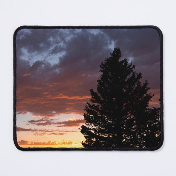 Item preview, Intense sunset with large tree silhouetted in foreground designed and sold by lisavonbiela.