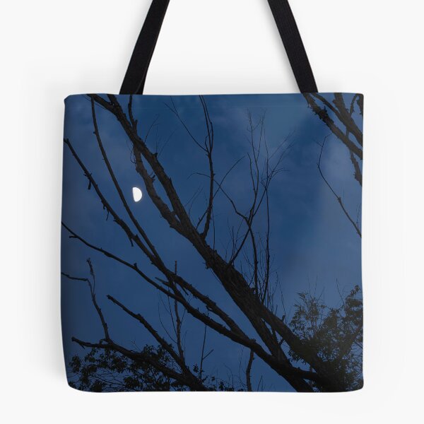 Item preview, Moon framed between tree branches in twilight designed and sold by lisavonbiela.