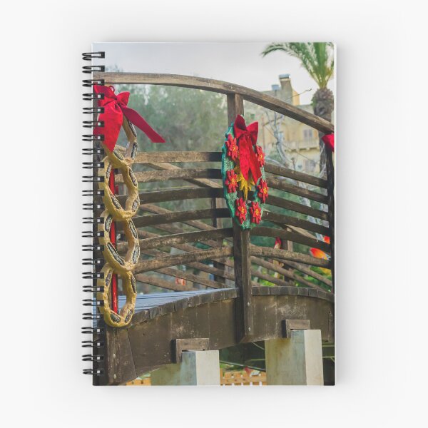 Item preview, Festive Wooden Bridge Decorated With Christmas Wreaths And Red Bows In Outdoor Park Setting designed and sold by Nmallia.