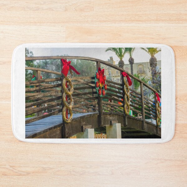 Item preview, Festive Wooden Bridge Decorated With Christmas Wreaths And Red Bows In Outdoor Park Setting designed and sold by Nmallia.