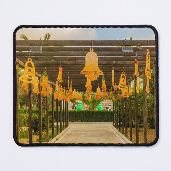 Item preview, Festive Yellow Bells Hanging From Pergola Over Park Walkway With Christmas Decorations designed and sold by Nmallia.