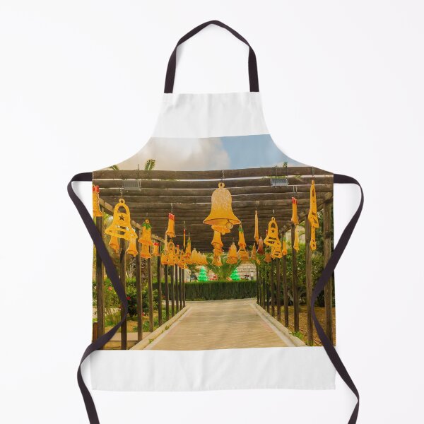 Item preview, Festive Yellow Bells Hanging From Pergola Over Park Walkway With Christmas Decorations designed and sold by Nmallia.