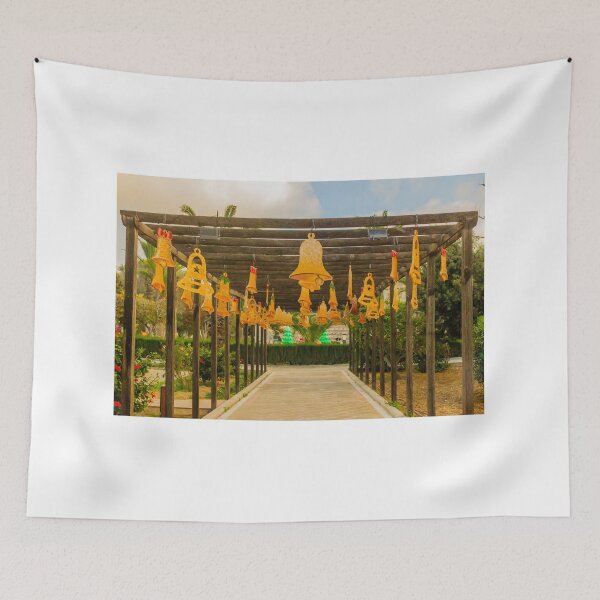 Item preview, Festive Yellow Bells Hanging From Pergola Over Park Walkway With Christmas Decorations designed and sold by Nmallia.