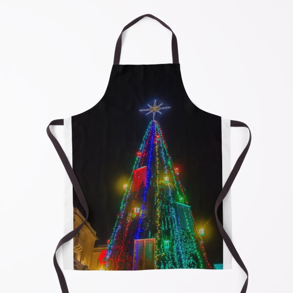 Item preview, Colorful Christmas Tree With Star Topper and Multicolored Lights Decorating City Square At Night designed and sold by Nmallia.