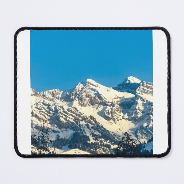 Item preview, Snowy Alpine Peaks Under Blue Sky | Mountain Landscape Photography | Winter Nature Print designed and sold by StyleForge Apparel.