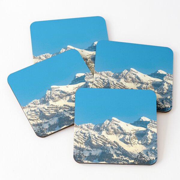 Item preview, Snowy Alpine Peaks Under Blue Sky | Mountain Landscape Photography | Winter Nature Print designed and sold by StyleForge Apparel.
